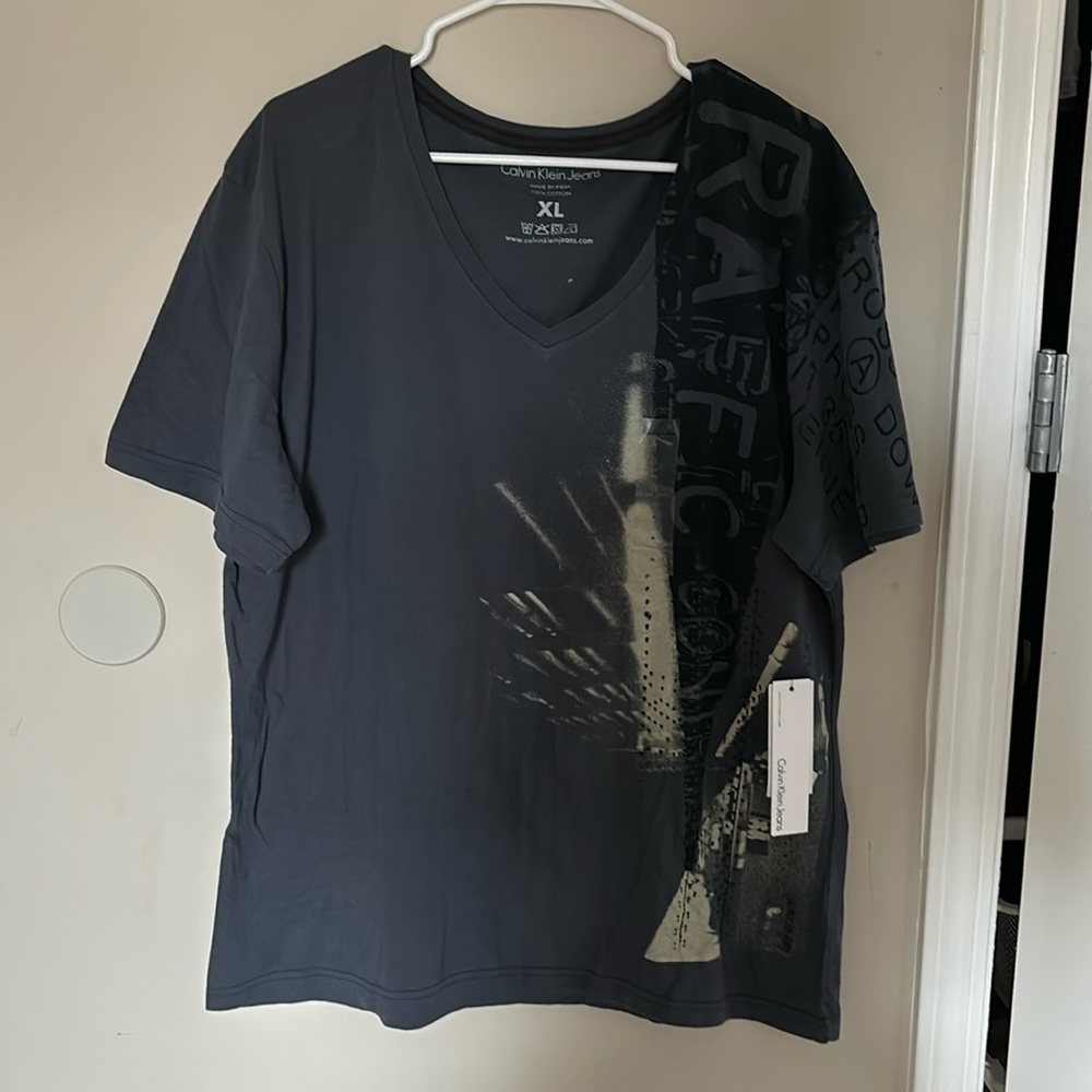 Brand new excellent condition t shirt.